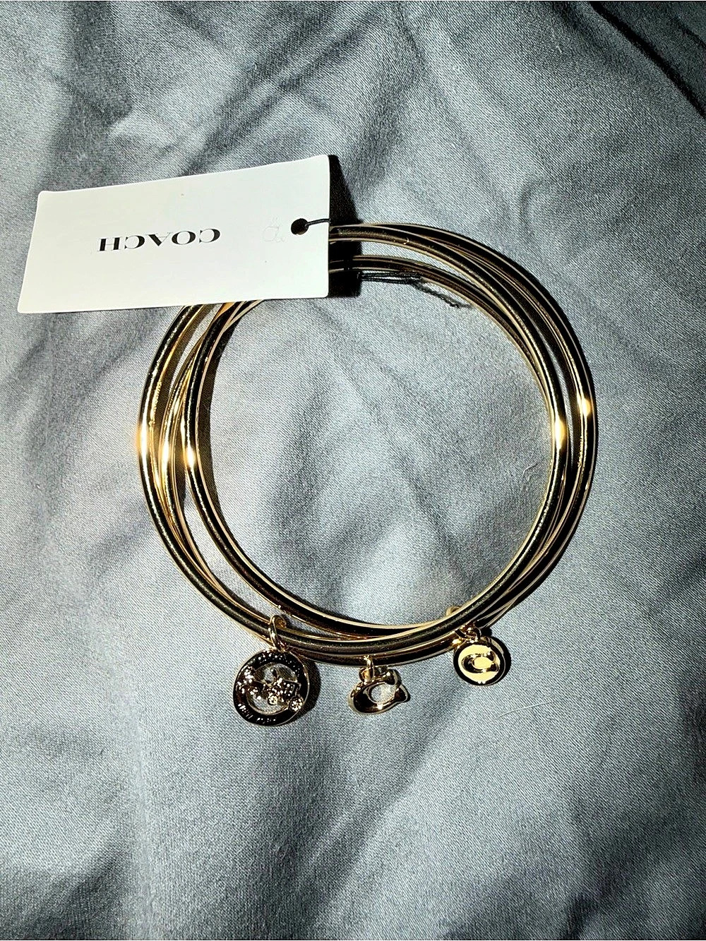 COACH Horse & Carriage Trio Charm Bangle Bracelet Set Gold Bangle Bracelet Set